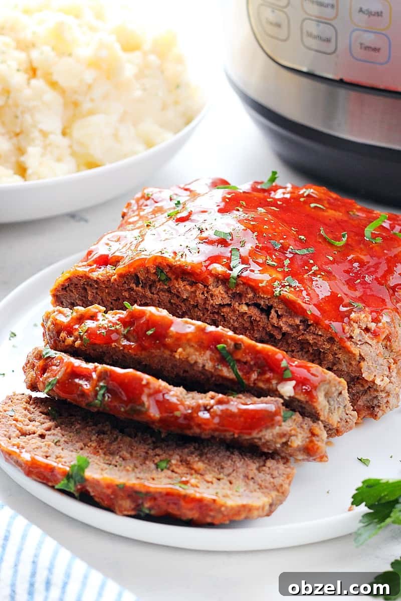 14-Day Instant Pot Meal Plan with Recipes and Grocery List 15 Meatloaf next to Instant Pot.