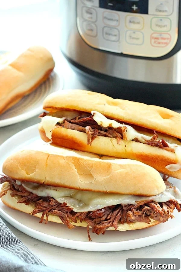 14-Day Instant Pot Meal Plan with Recipes and Grocery List 16 French Dip sandwich on a plate.