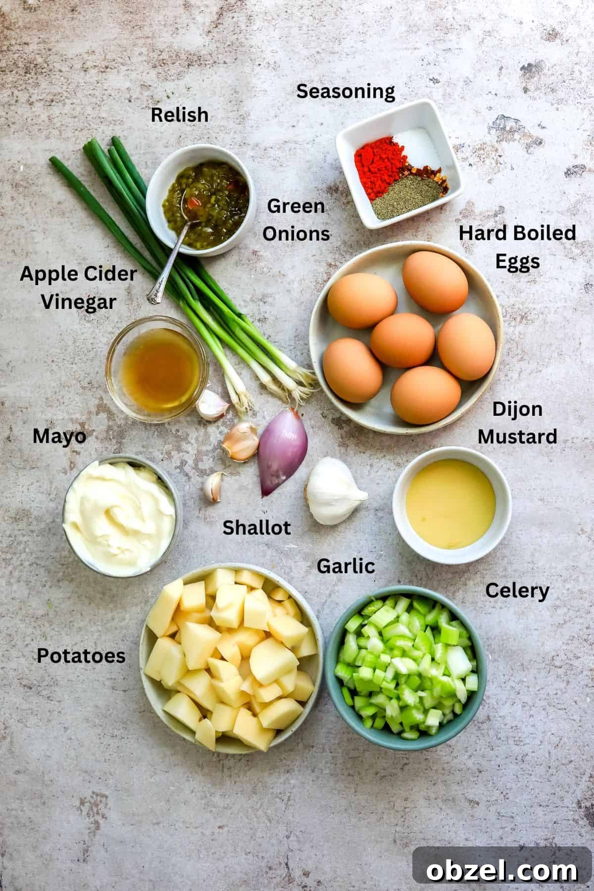 Deviled Egg Potato Salad Recipe 3 Ingredients needed to make this potato salad in small bowls and measuring cups.