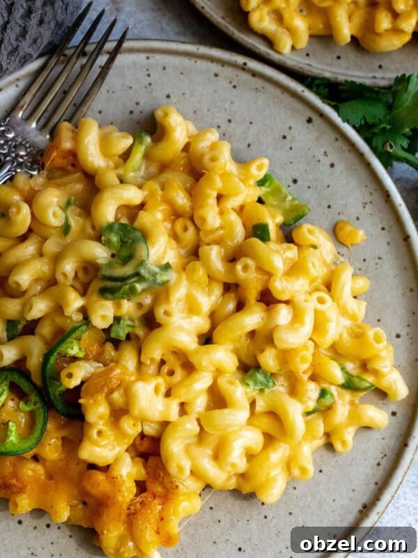 Deviled Egg Potato Salad Recipe 6 Cheesy noodles on a plate with a silver fork