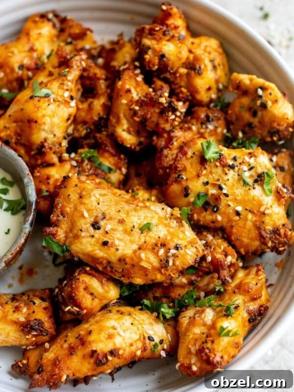 Deviled Egg Potato Salad Recipe 7 White ceramic bowl with chicken tenders and dipping sauce.