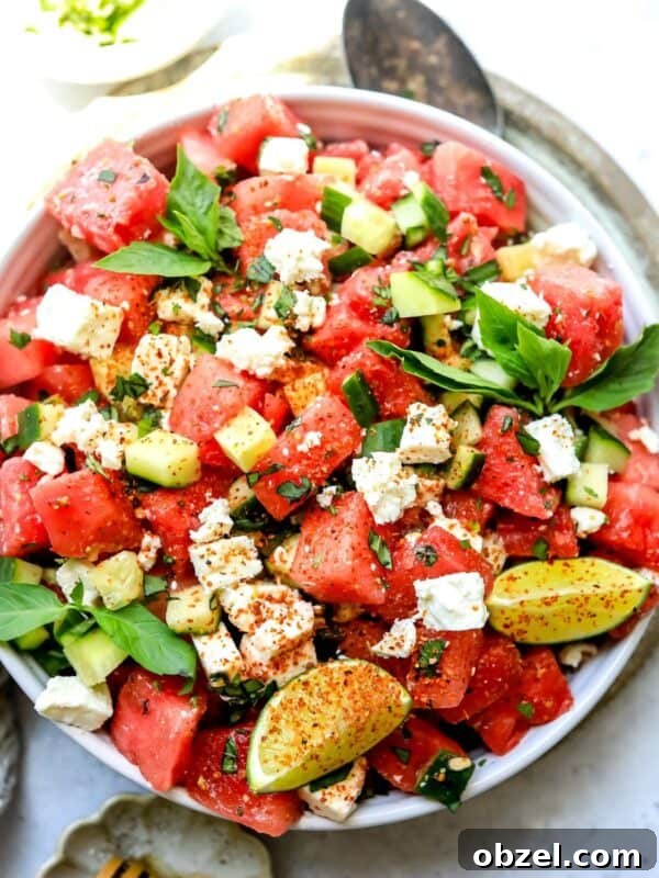 Deviled Egg Potato Salad Recipe 8 White bowl with ingredients mixed together to make watermelon salad with feta.