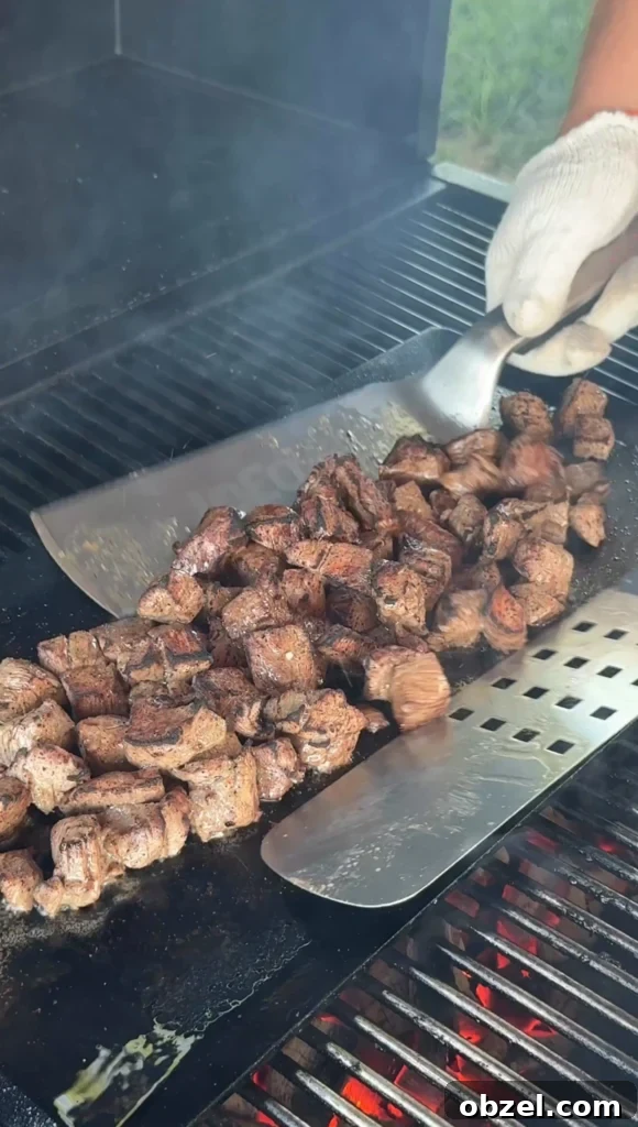 Loaded Baked Potatoes with Grilled Steak Bites 8 grilled steak bites on the griddle