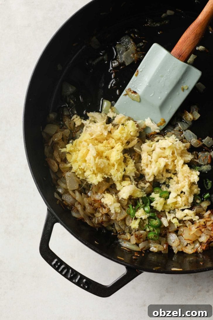 garlic, ginger, and green chili pepper added to browned onions