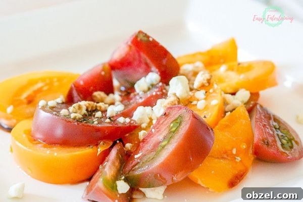 Heirloom Tomato Salad with Fresh Basil and Mozzarella 3 sliced heirloom tomatoes prepared for salad