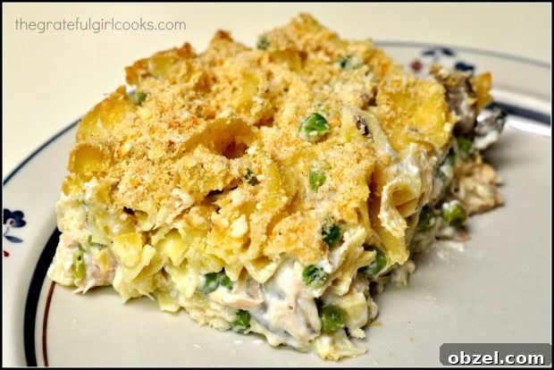 Mom's Tuna Noodle Casserole - The Grateful Girl Cooks! Mom's Tuna Noodle Casserole cut into serving size on a plate.