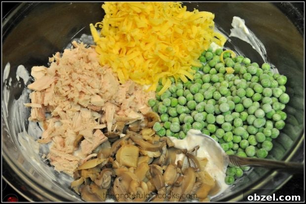 Mom's Tuna Noodle Casserole - The Grateful Girl Cooks! Tuna, mushrooms, cheddar cheese and peas are added to sauce for tuna noodle casserole.