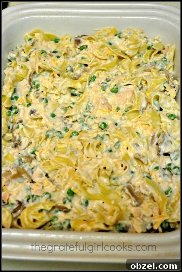 Mom's Tuna Noodle Casserole - The Grateful Girl Cooks! Tuna noodle casserole placed in baking dish, before going into the oven.