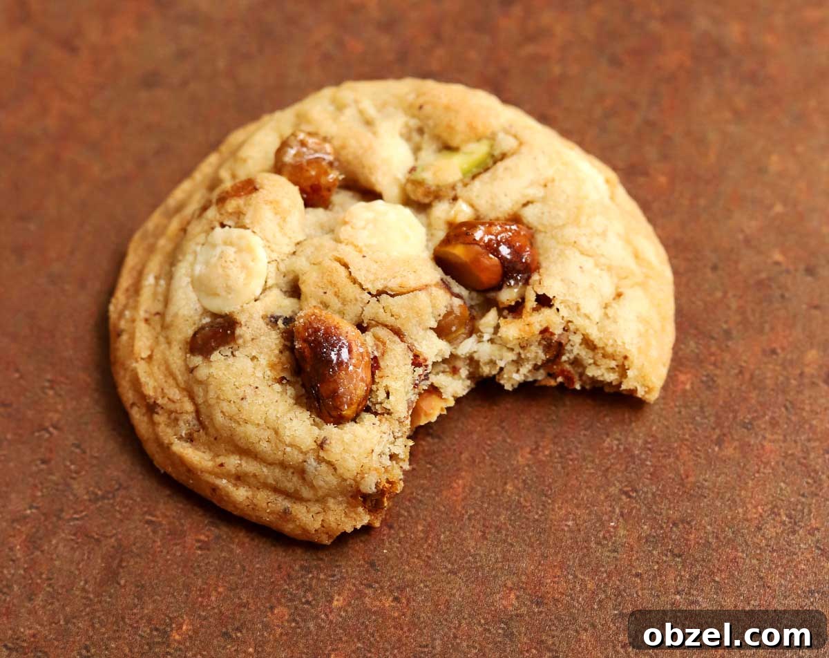 Brown Butter Pistachio White Chocolate Cookies 8 caramelized pistachio brown butter white chocolate cookie with bite