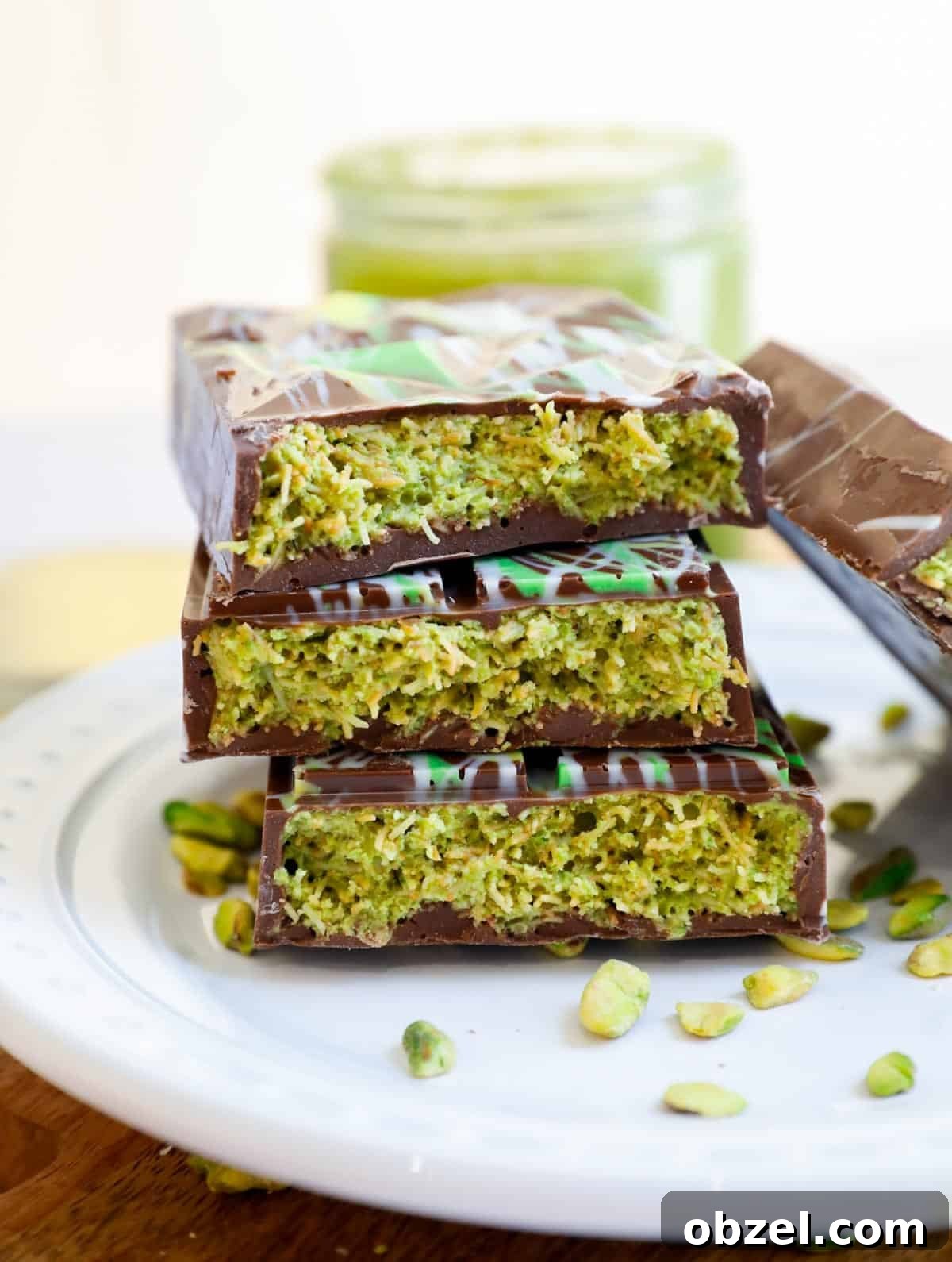 Dubai Chocolate Bar Recipe with Pistachio Knafeh Filling 2 Dubai Chocolate Bar split in half and stacked on top of each other.