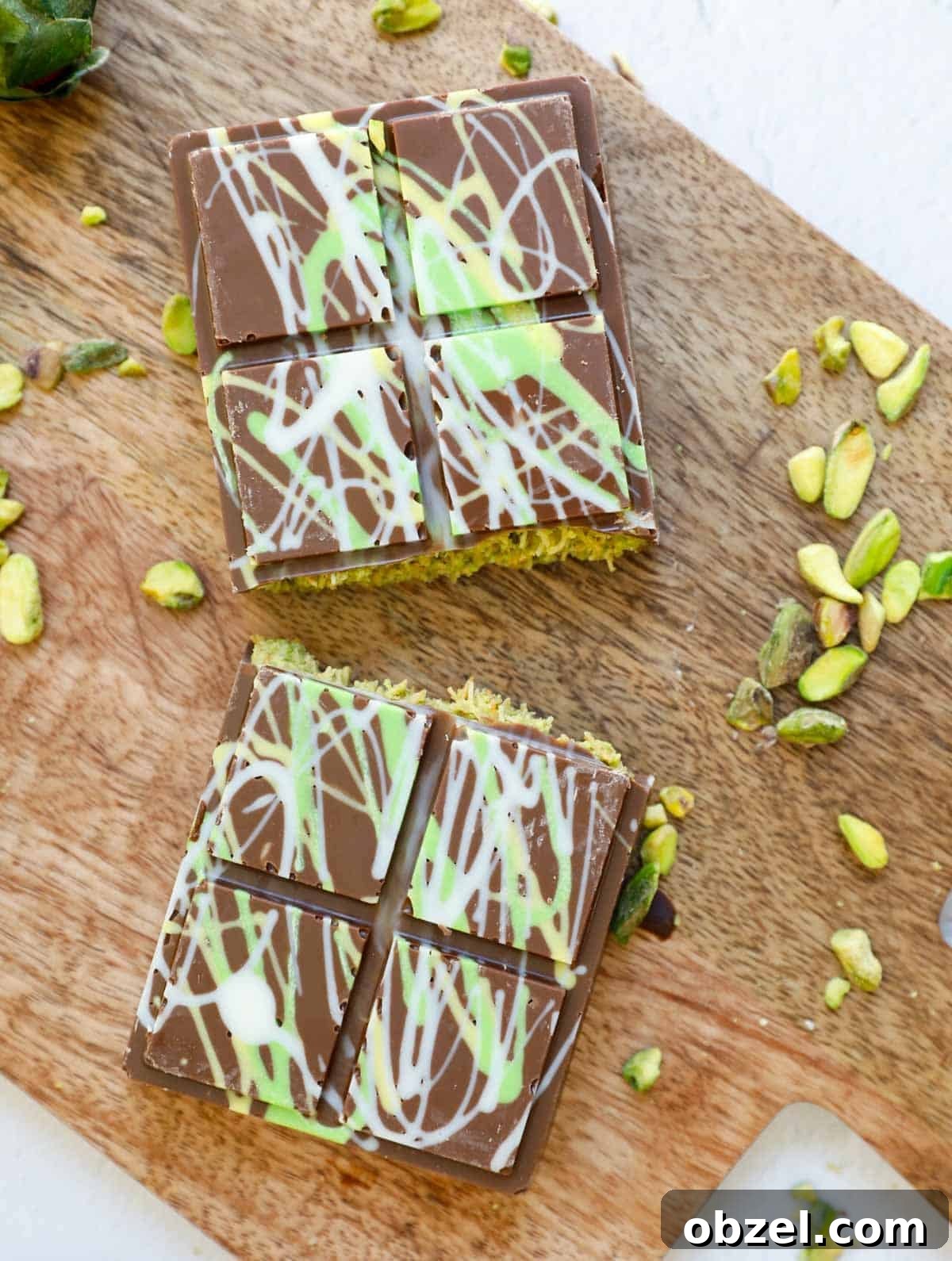 Dubai Chocolate Bar Recipe with Pistachio Knafeh Filling 13 A dubai pistachio chocolate bar cut in half.