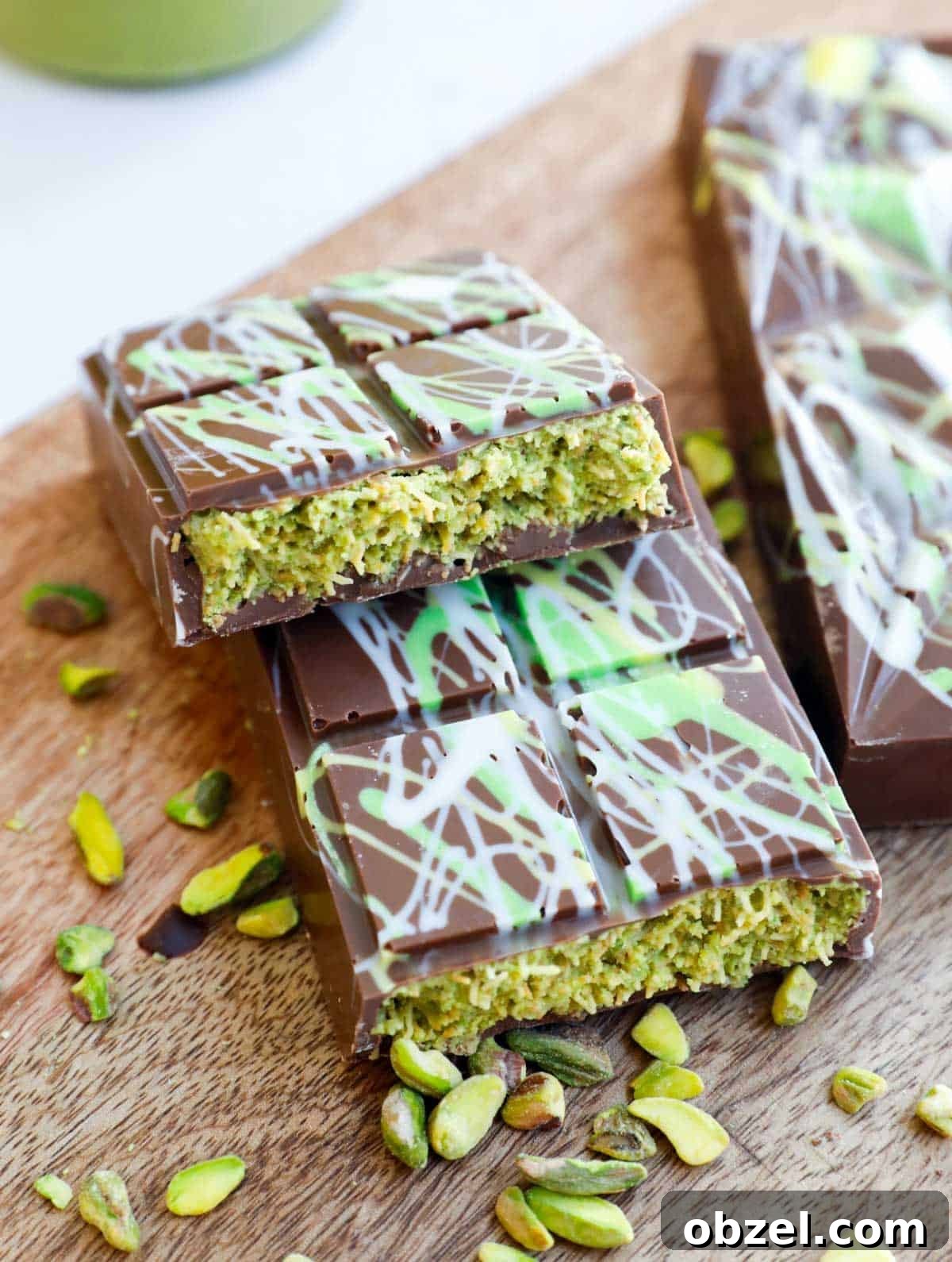 Dubai Chocolate Bar Recipe with Pistachio Knafeh Filling 14 Dubai Chocolate Bar split in half and stacked on top of each other.