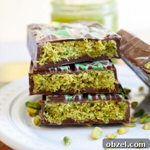 Dubai Chocolate Bar Recipe with Pistachio Knafeh Filling 15 Dubai Chocolate Bar split in half and stacked on top of each other.
