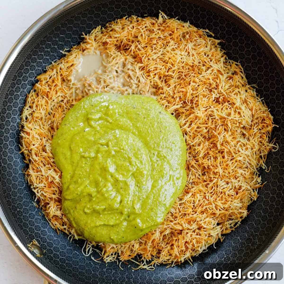 Dubai Chocolate Bar Recipe with Pistachio Knafeh Filling 5 Adding pistachio and tahini to the toasted kataifi crip.