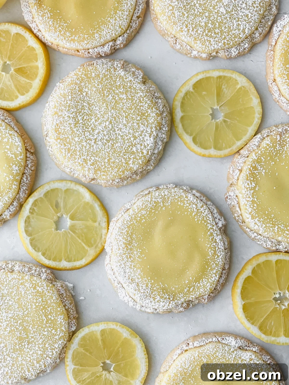 Lemon Curd Cookies with Tangy Citrus Filling 3 Homemade lemon curd cookies on a tray