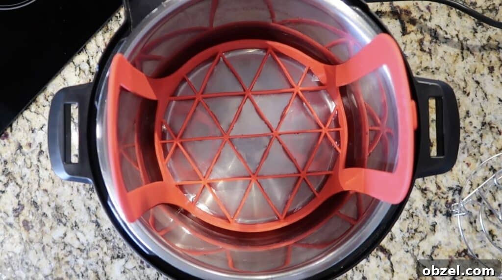 Adding silicone sling to pot with water
