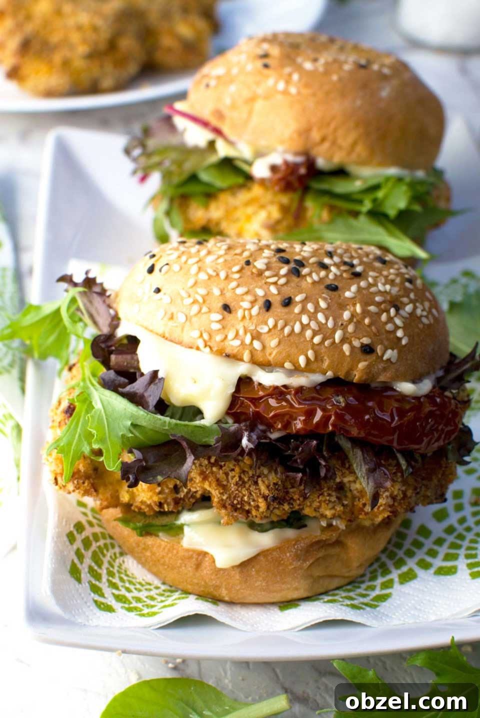 15 Air Fryer Chicken Thigh Recipes for Crispy, Juicy Results 4 Two burgers on serving platter.