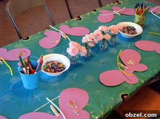 Tinker Bell Tea Party: Decorations, Games and Treats 4 fairy wing station on table with paper wings and markers