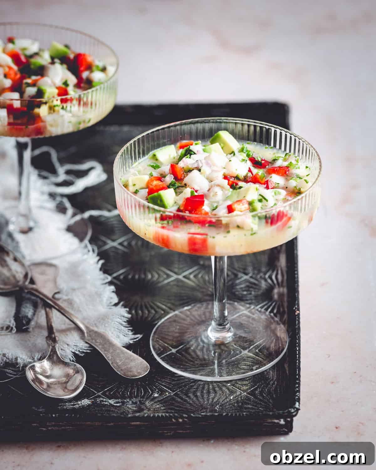 Citrus Scallop Ceviche Recipe with Lime and Fresh Herbs 2 Scallop ceviche served in an elegant champagne glass.