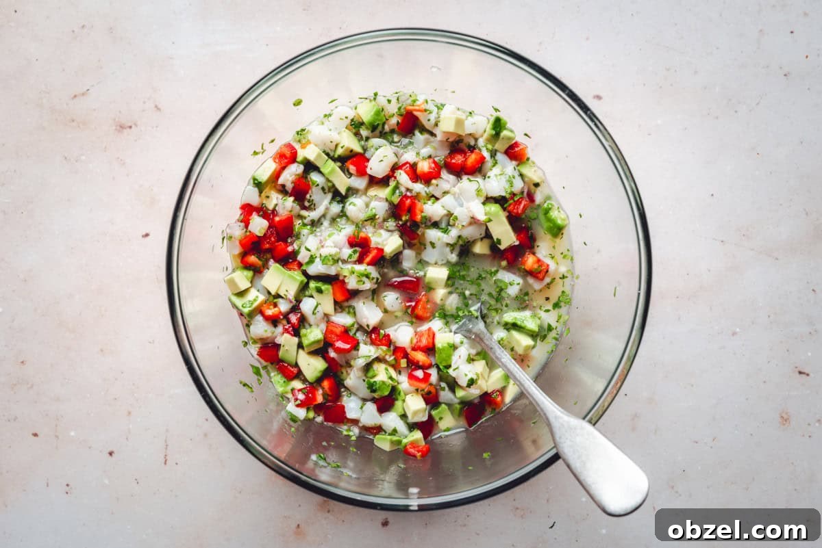 Citrus Scallop Ceviche Recipe with Lime and Fresh Herbs 8 Scallop ceviche ready to be portioned to serving bowls.