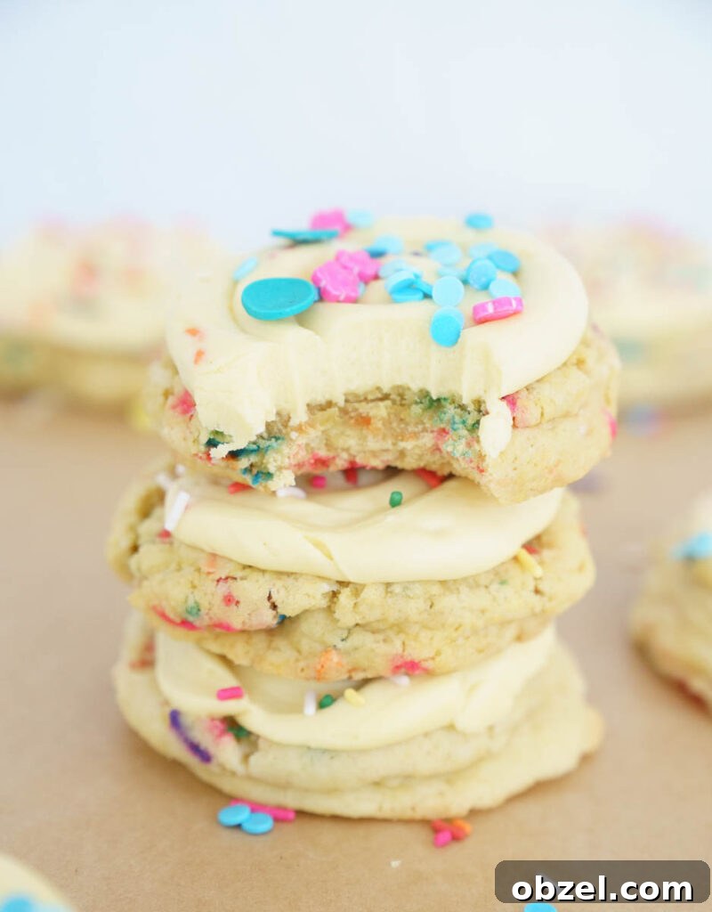 Frosted birthday cake cookies with rainbow sprinkles