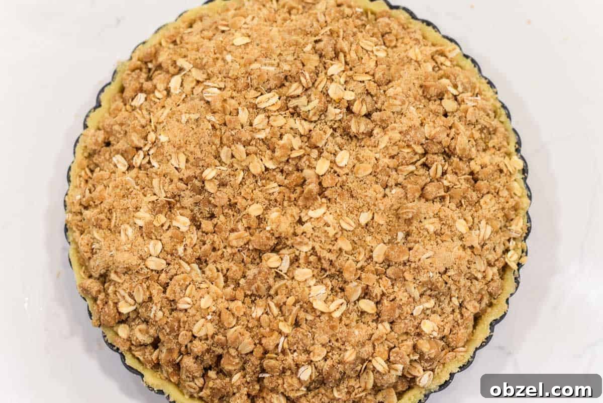 Apple crumble tart before being baked.