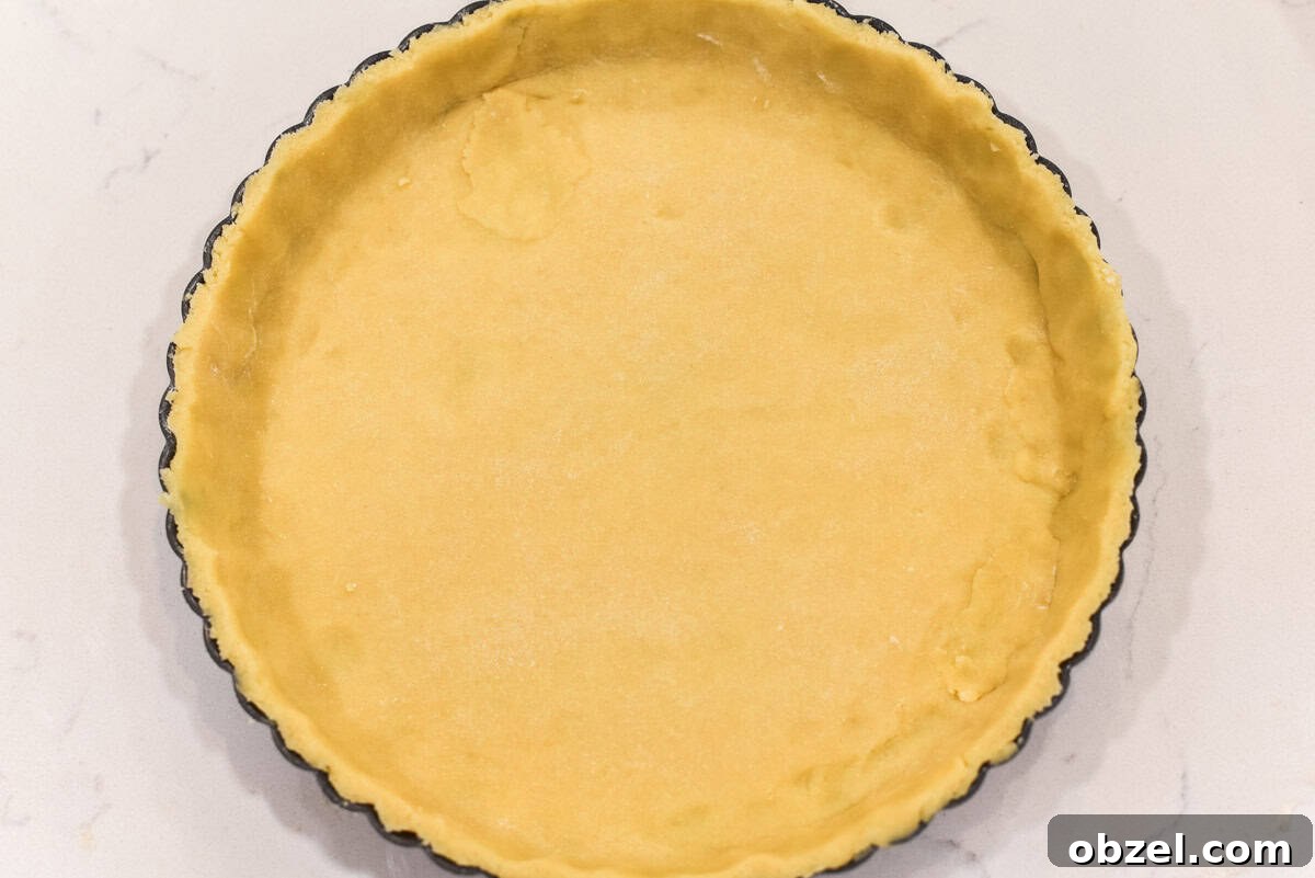 Shortcrust pastry in tart pan.