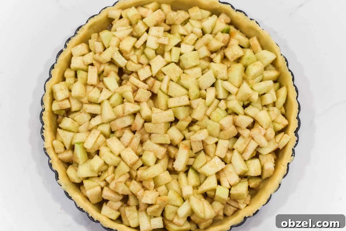Filling ingredients in tart.