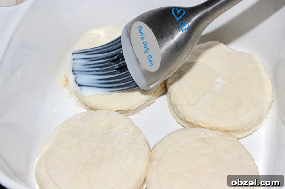 Flaky Honey Buttermilk Biscuits 11 Honey buttermilk biscuits in a baking dish