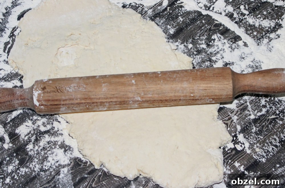 Flaky Honey Buttermilk Biscuits 7 Rolling homemade biscuit dough