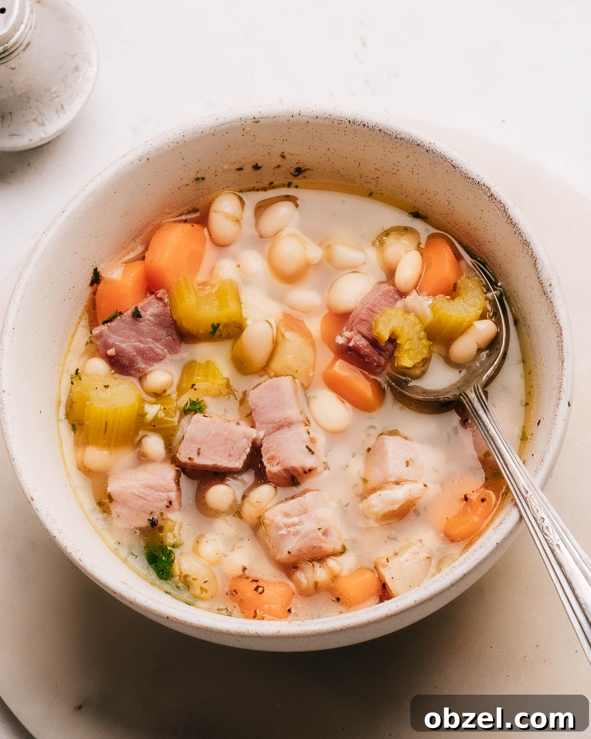 Hearty ham bone soup in a bowl