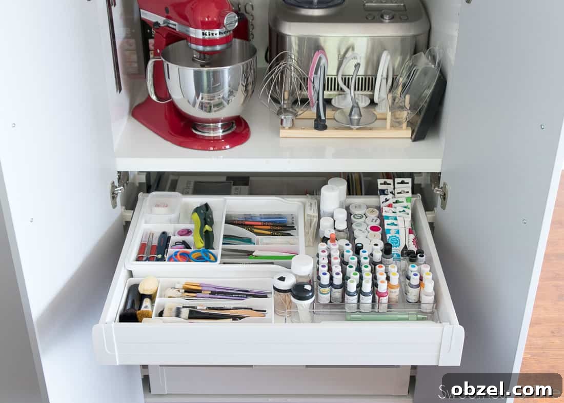 Kitchen Renovation and New Cake Pantry Reveal 22 One of the large drawers in the lower part of the pantry, showing neatly organised food colouring bottles, paintbrushes and tools.