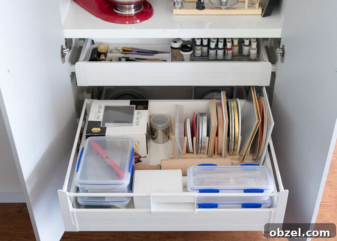 Kitchen Renovation and New Cake Pantry Reveal 23 The middle of the lower drawers, with cake cards, a pasta machine and other tools.