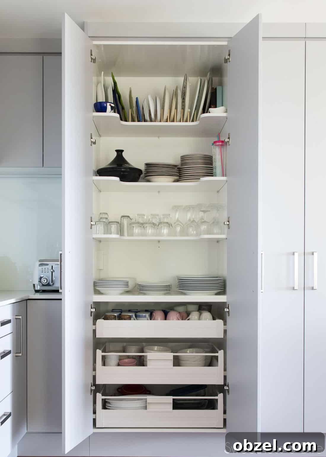 Kitchen Renovation and New Cake Pantry Reveal 10 The inside of one of the large pantries, showing crockery and glassware.