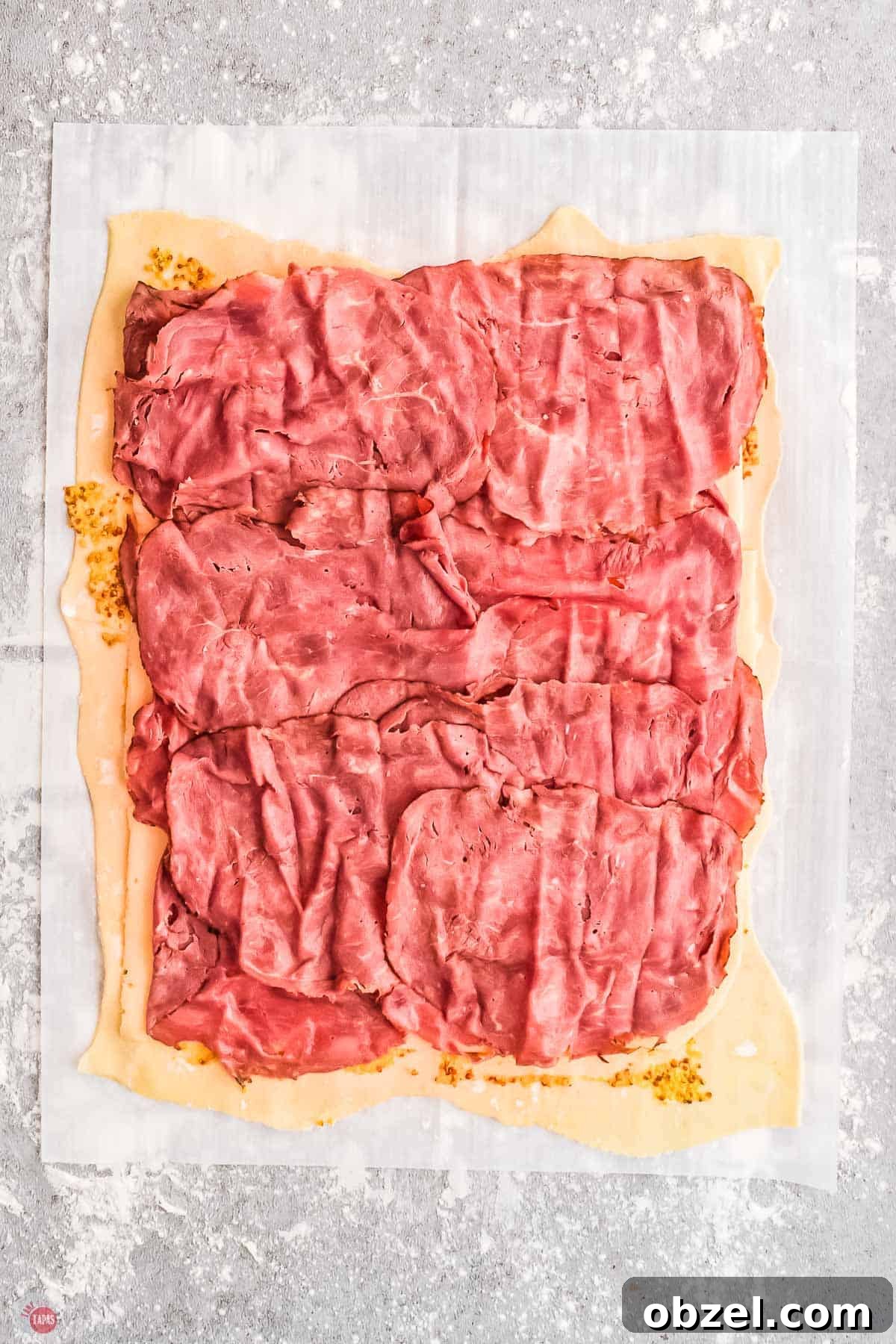 Corned Beef Sliders with Swiss Cheese and Mustard 6 sliced corned beef on puff pastry is my new favorite sandwich