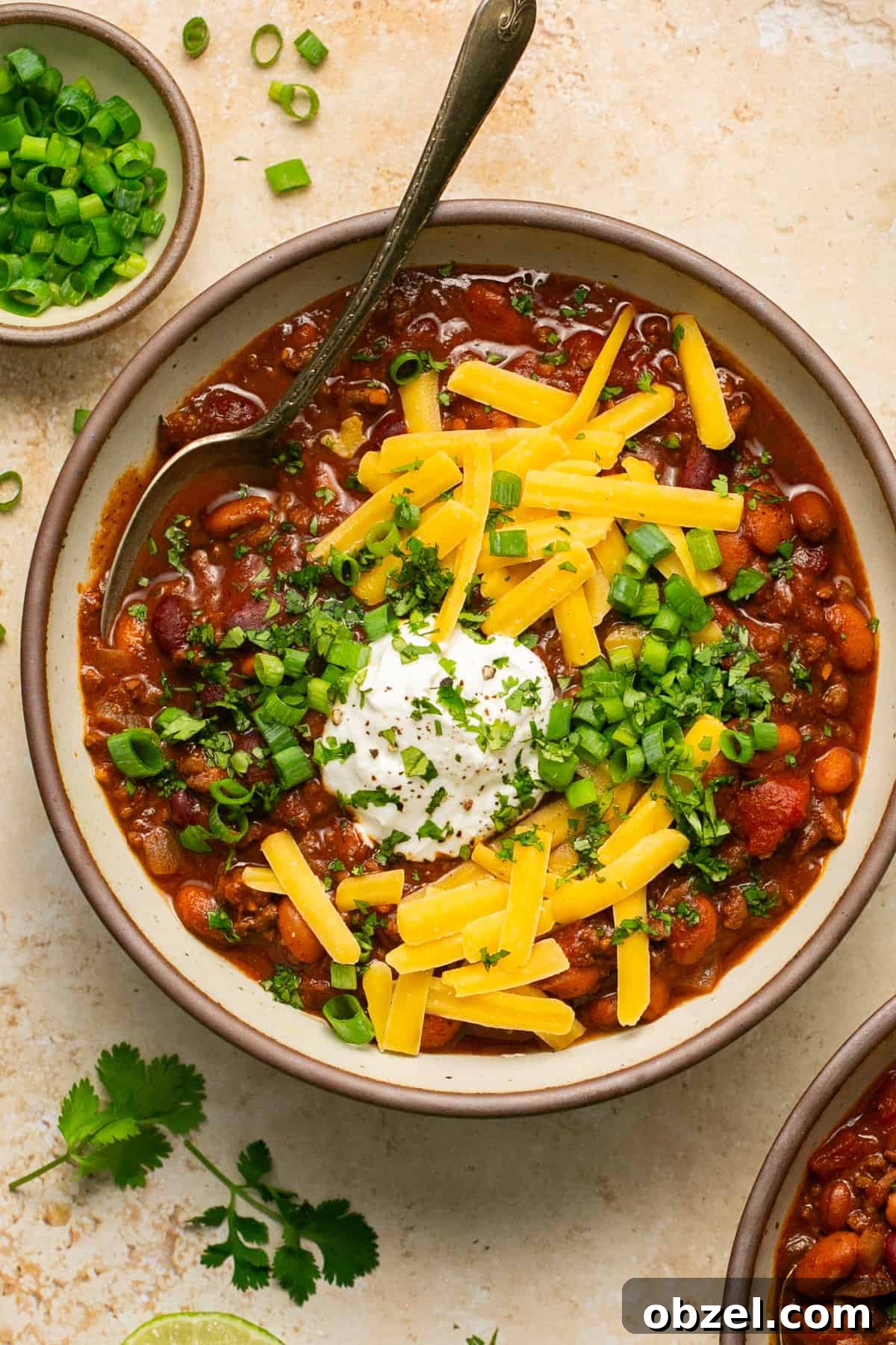 beef chili with cheese in bowl