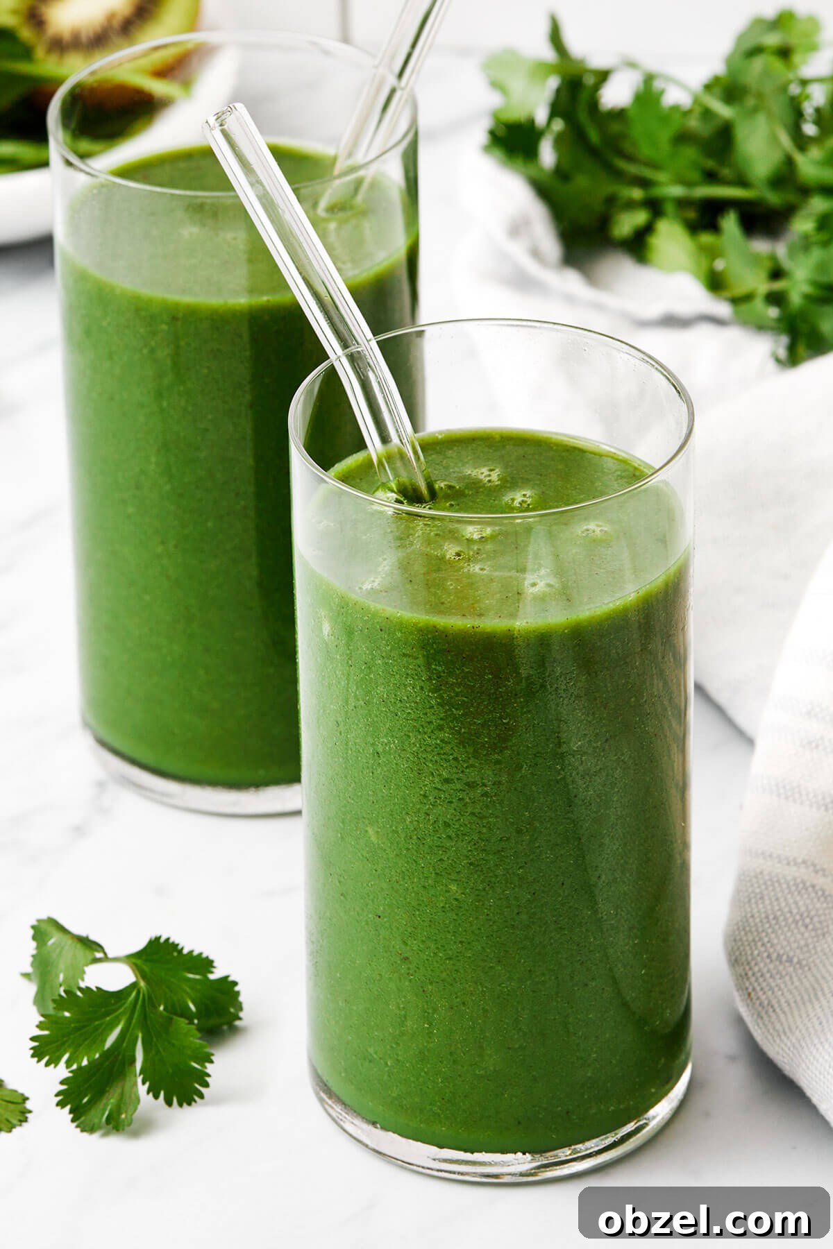 Two glasses of cilantro smoothie
