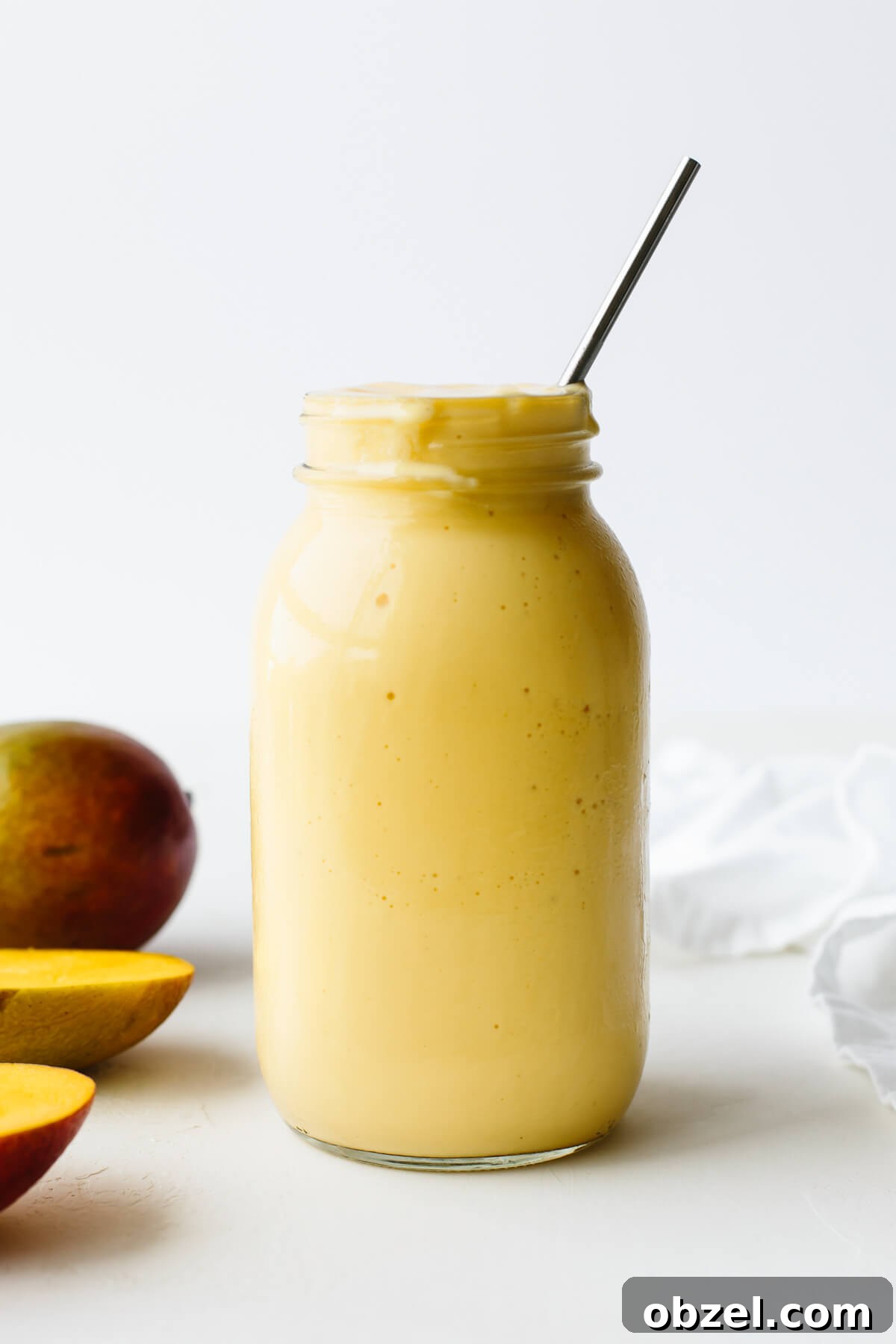 Mango smoothie in a mason jar