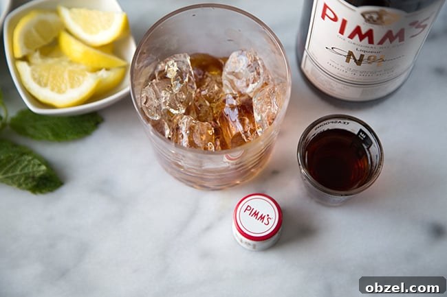 Summer Pimms Cup Cocktail Recipe 5 Pimm's No. 1 poured over ice