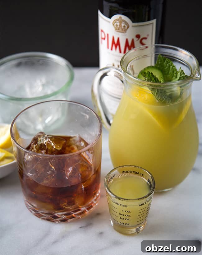 Summer Pimms Cup Cocktail Recipe 6 glass of Pimm's No. 1 over ice with homemade cucumber mint lemonade