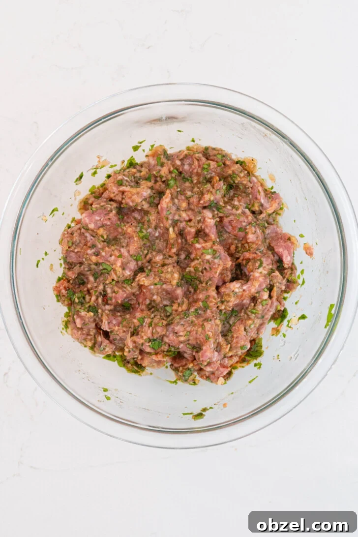 Tender Juicy Baked Moroccan Lamb Meatballs 6 A bowl of ground lamb meatball mix.