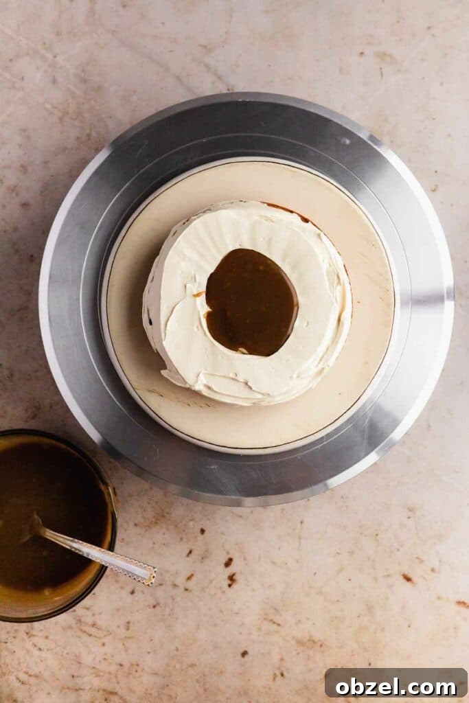 Filling the cake with buttercream and butterscotch