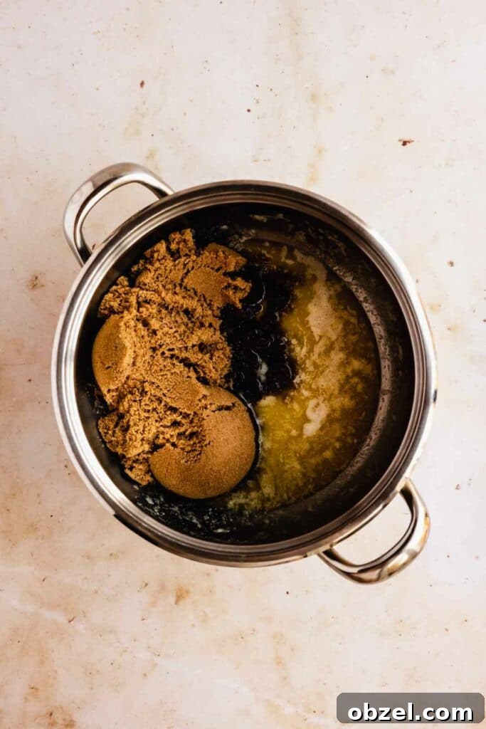 Combining butterscotch ingredients into saucepan