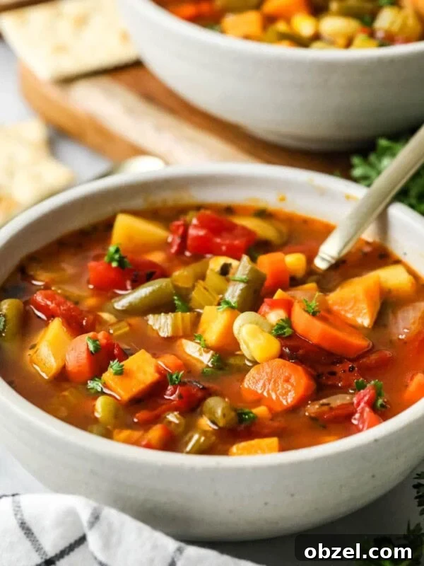 Homemade Sourdough Bread Recipe with Starter 13 Bowl of vegetable soup made with carrots, potatoes, and more.