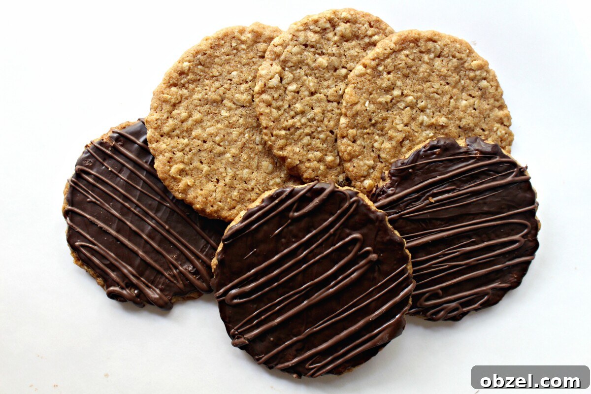 Chocolate Covered Hobnob Oat Cookies Recipe 6 Three oat cookies without chocolate and three with chocolate coating.