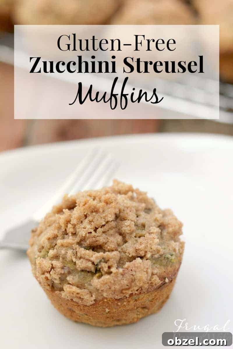 Gluten Free Zucchini Muffins with Streusel Topping 2 Image shows a close up of a zucchini streusel muffin on a plate with text above that reads "Gluten Free Zucchini Streusel Muffins"