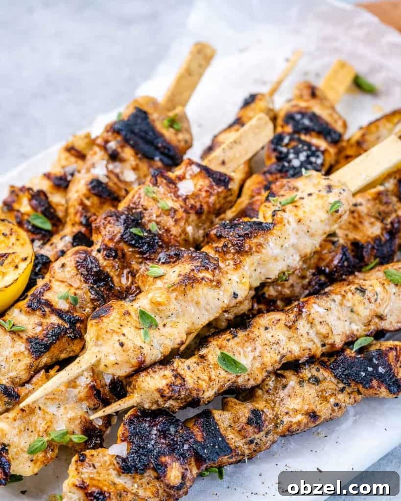 Grilled Lemon Chicken Skewers with Garlic and Herbs 3 top view of grilled lemon chicken kabobs