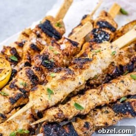 Grilled Lemon Chicken Skewers with Garlic and Herbs 10 top view of grilled lemon chicken kabobs