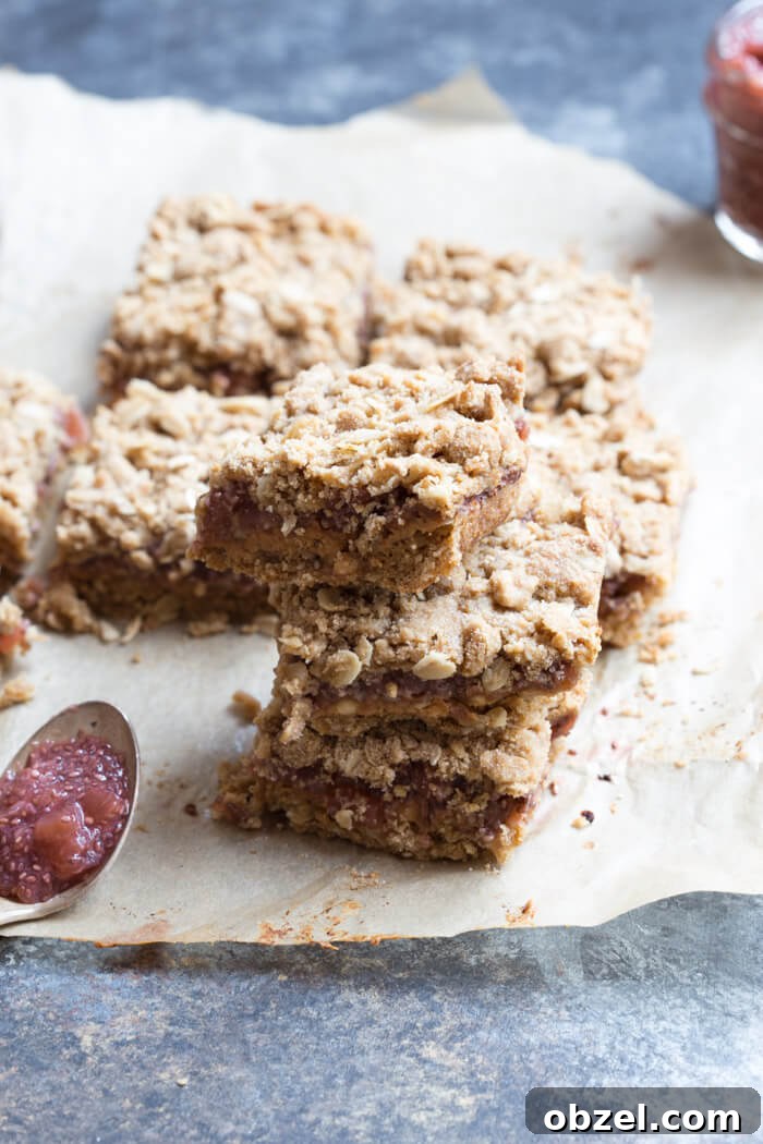 Watermelon chia jam spread over peanut butter for crumble bars