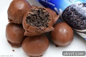 No Bake Caramel Oreo Truffles Recipe 2 Caramel Oreo Truffles made with buttery caramel, crushed Oreos, and melted chocolate coating.